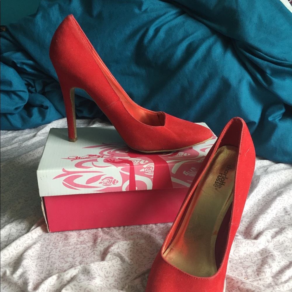 Never worn, red heels.